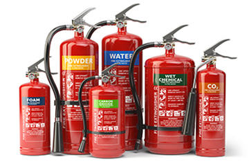 row of different types of fire extinguishers powder foam co2 wet chemical